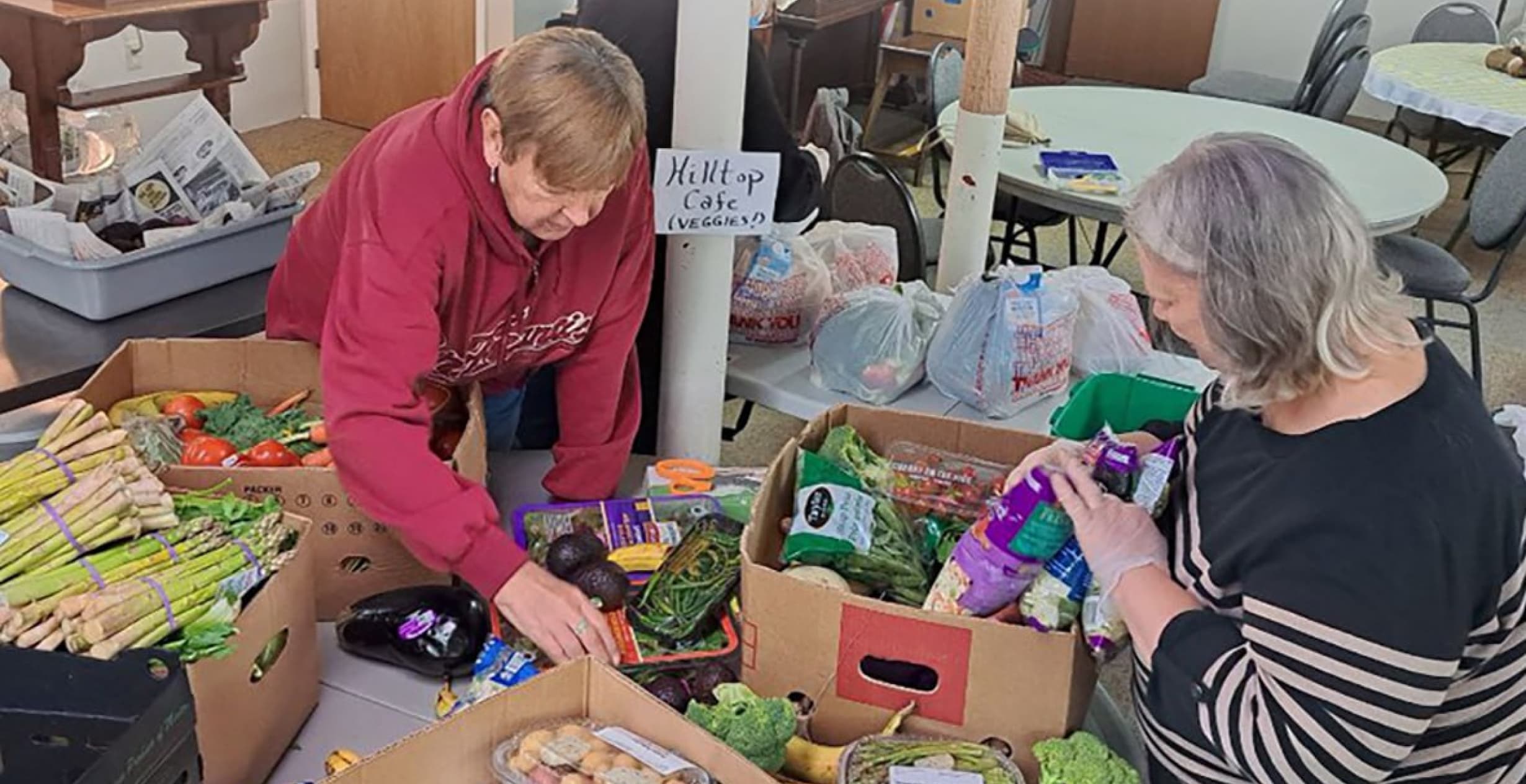 Volunteers sorting food